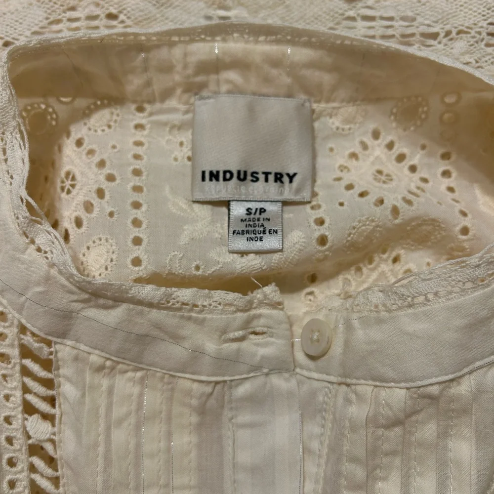 Elegant Cream Blouse with Embroidered Detailing